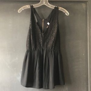 Black sleeveless blouse